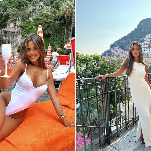 Tarsha Whitmore makes everyone hold their breath in Positano.  Model in total white from Arienzo beach 
